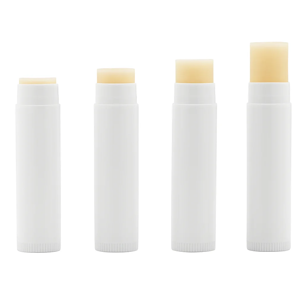 Unlabeled white lip balm tubes with balm extended